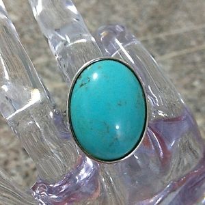 Turquoise ring.
